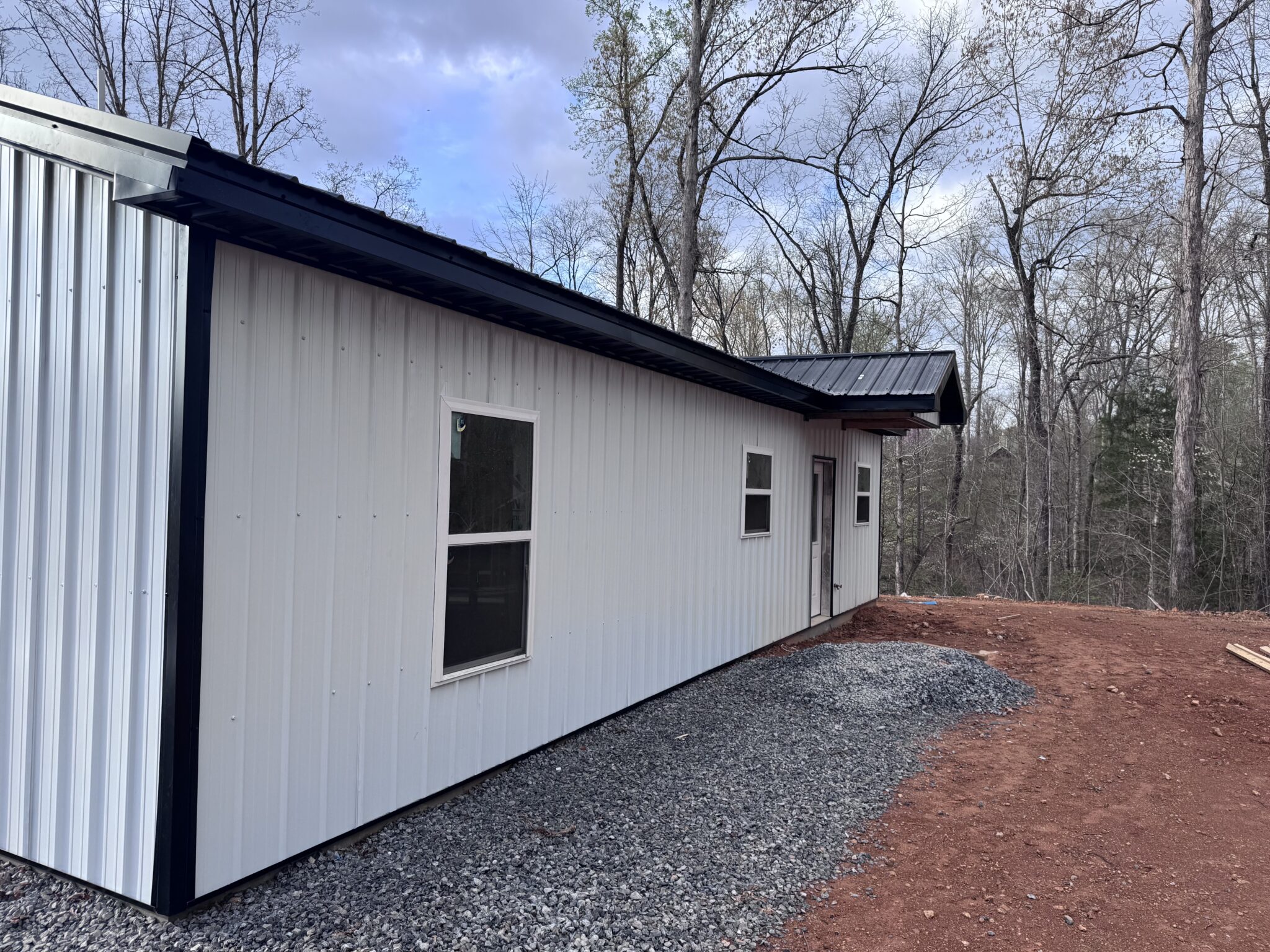 Image of the side of a newly constructed metal building