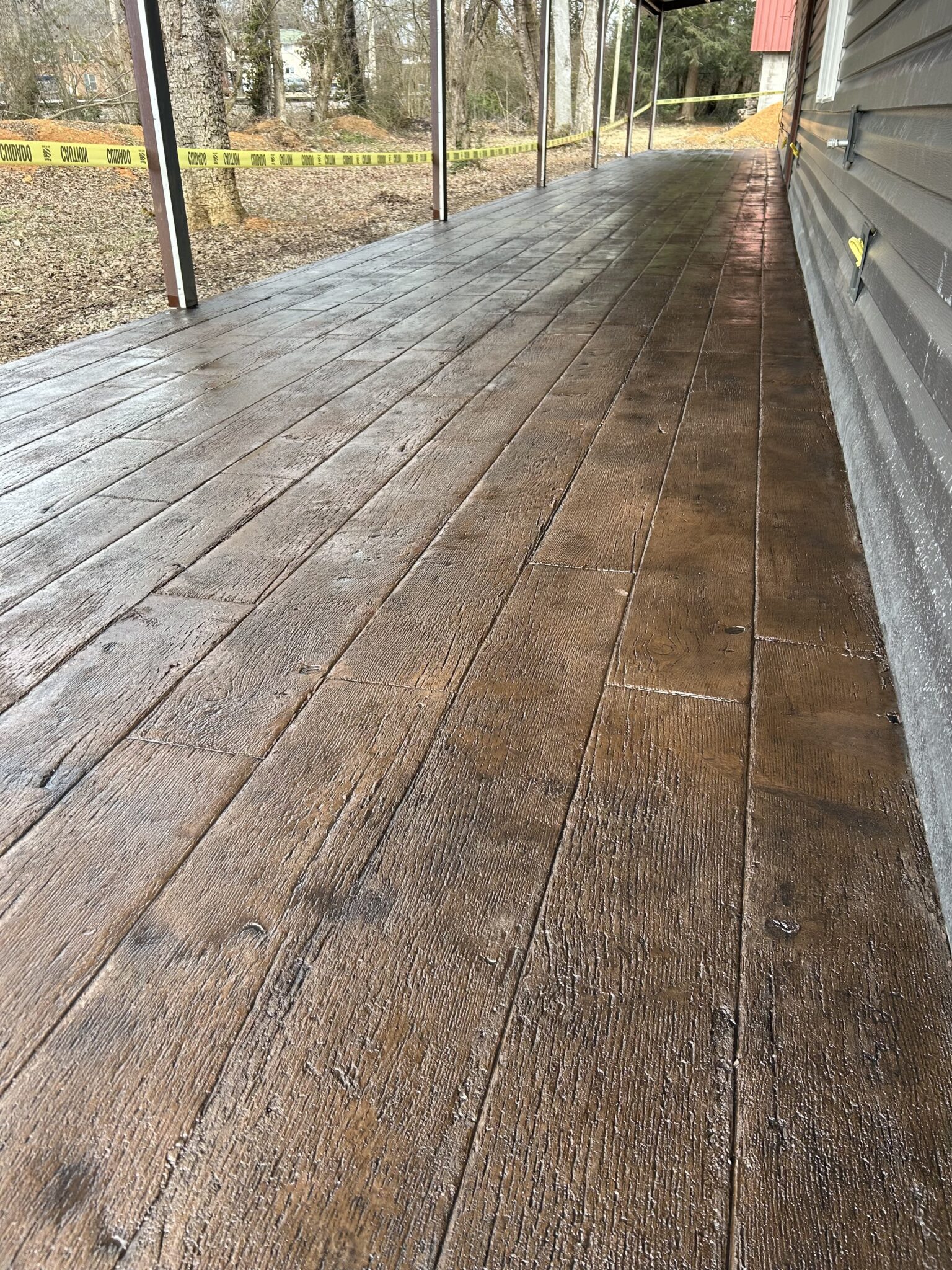 Stamped concrete brown wood look